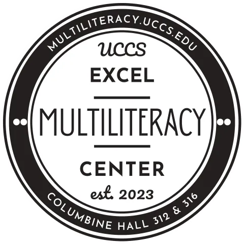 Excel Multiliteracy Center logo. A circle with black and white outlining with the center's name in the middle and the center's web address and location (Columbine 312 & 316) around the circle's border.